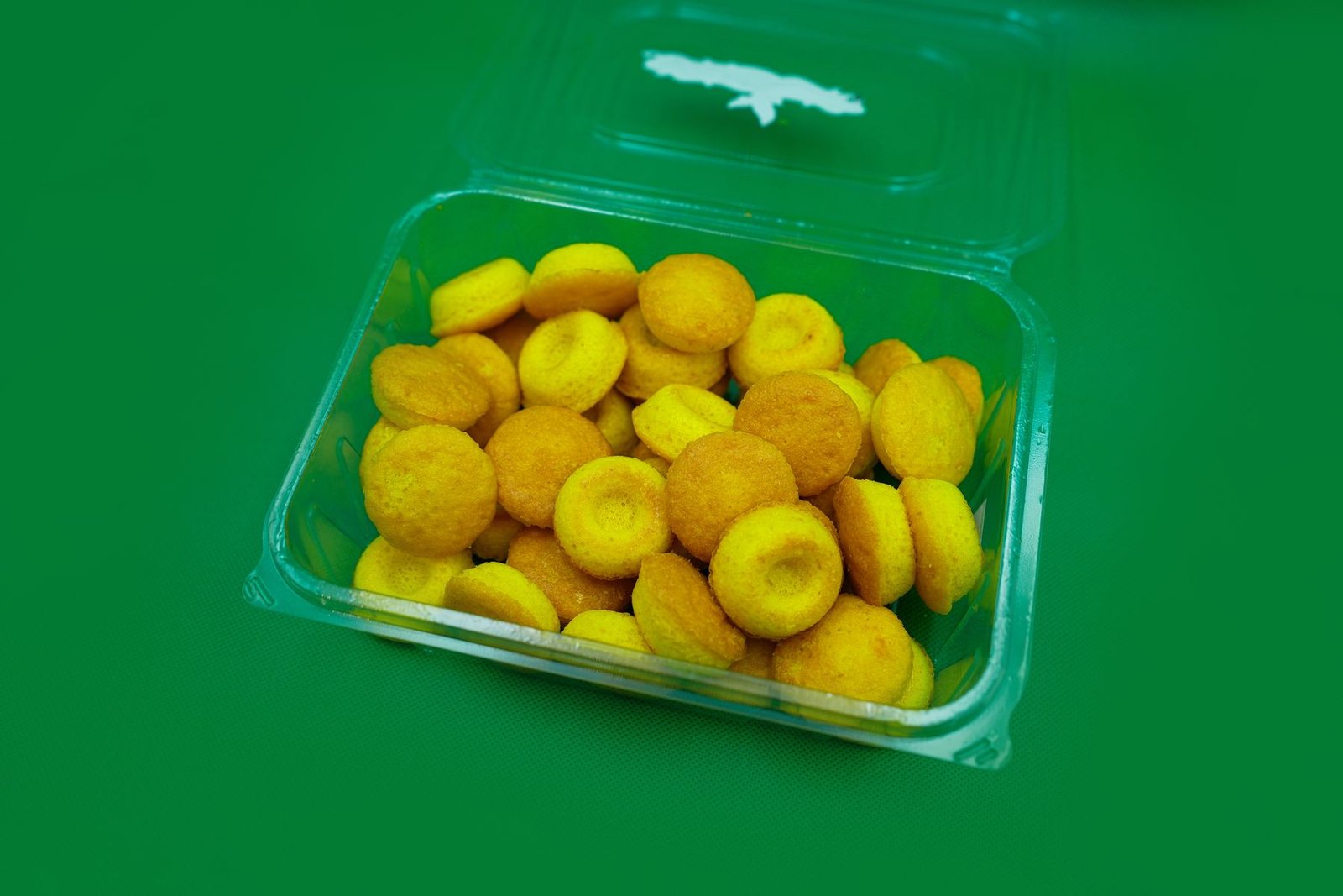 Golden baked sweet bites in a container